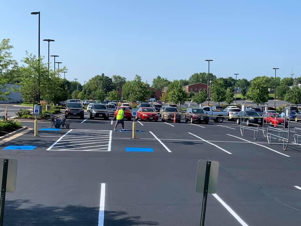 Platinum Paving crew installing asphalt on a commercial parking lot